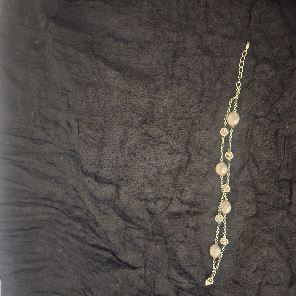 Elegant Gold and Silver Bracelet